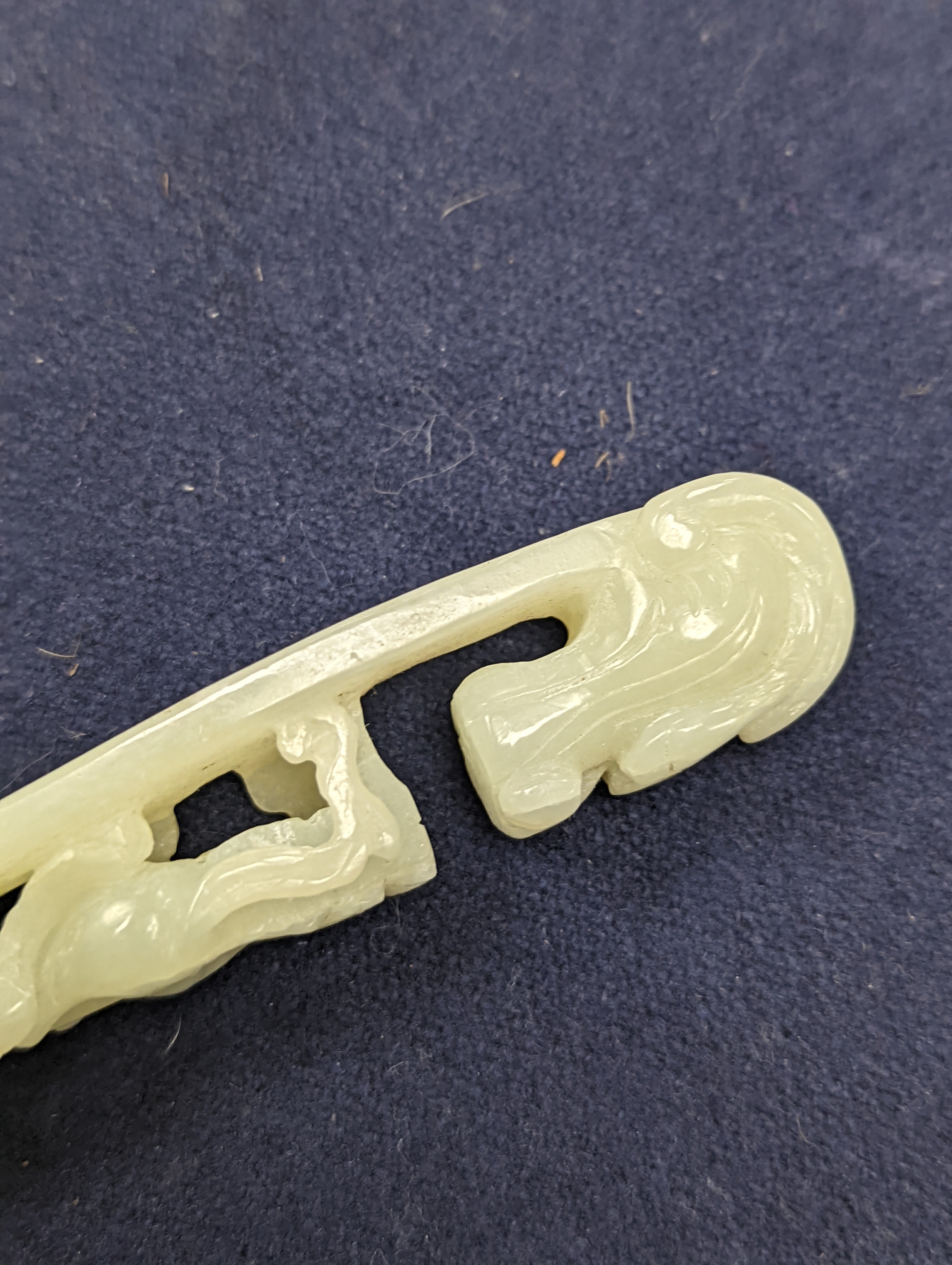 A Chinese jade belt hook, 12.5cm an archer's ring and figure, a stone cup and a glass snuff bottle
